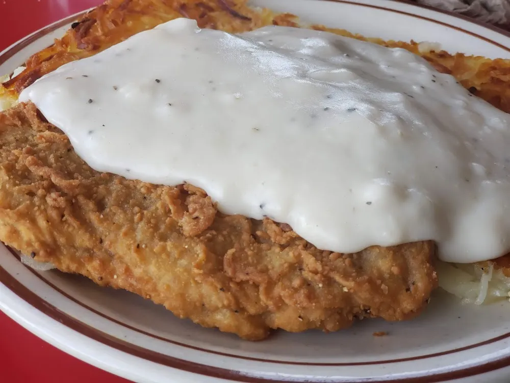 Country Fried Steak 2 Eggs Hash Browns & Toast